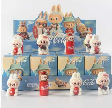 בובת הפתעה מיני לבובה צבעונית / עיצובים של קולה : image 1 בובת הפתעה מיני לבובה צבעונית / עיצובים של קולה : image 1